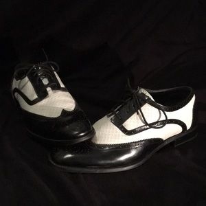 Black and white wingtip dress shoes